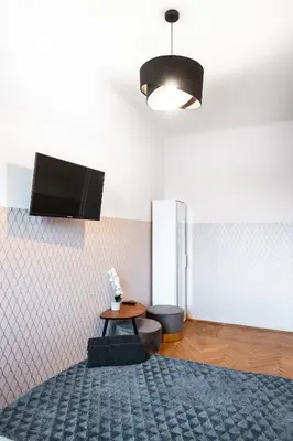 Telewizja i/lub zestaw kina domowego w obiekcie ClickTheFlat Wilcza 35 City Center Apart Rooms