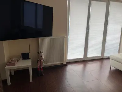 Telewizja i/lub zestaw kina domowego w obiekcie ViviAppartments, Warsaw - przy metro