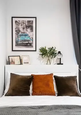 Łóżko lub łóżka w pokoju w obiekcie Żoliborz Elite Apartment by BookingHost