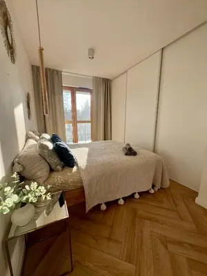 Łóżko lub łóżka w pokoju w obiekcie Rudnickiego, Fort Bema, free parking by Cosmo Spirit