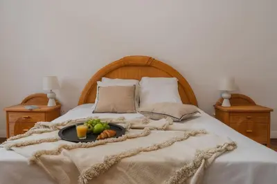 Łóżko lub łóżka w pokoju w obiekcie Warsaw Concierge Targowa