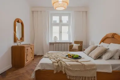 Łóżko lub łóżka w pokoju w obiekcie Warsaw Concierge Targowa