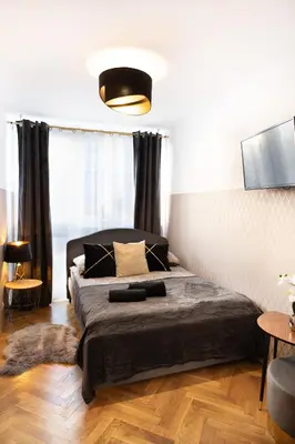 Łóżko lub łóżka w pokoju w obiekcie ClickTheFlat Pereca City Centre Apart Rooms