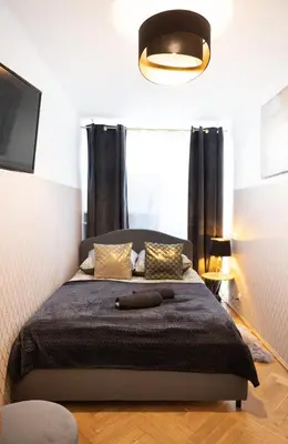 Łóżko lub łóżka w pokoju w obiekcie ClickTheFlat Pereca City Centre Apart Rooms