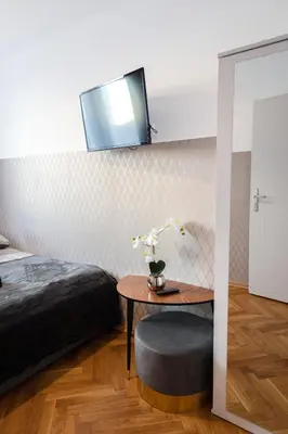 Łóżko lub łóżka w pokoju w obiekcie ClickTheFlat Pereca City Centre Apart Rooms