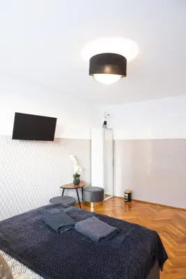 Łóżko lub łóżka w pokoju w obiekcie ClickTheFlat Pereca City Centre Apart Rooms