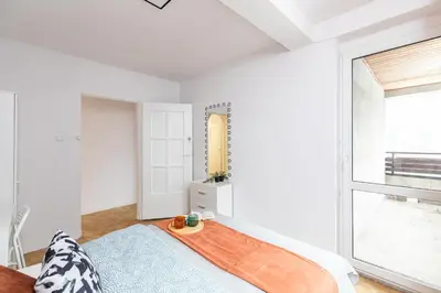 Łóżko lub łóżka w pokoju w obiekcie ROOM Bohaterów Września - Blisko Blue City
