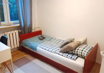 Łóżko lub łóżka w pokoju w obiekcie ROOM Bohaterów Września - Blisko Blue City