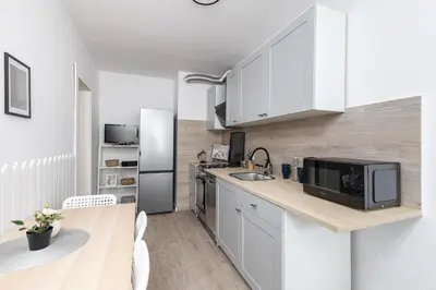 Kuchnia lub aneks kuchenny w obiekcie ROOM Bohaterów Września - Blisko Blue City