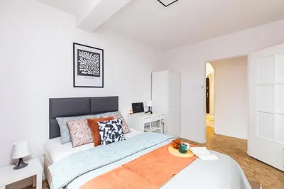 Łóżko lub łóżka w pokoju w obiekcie ROOM Bohaterów Września - Blisko Blue City