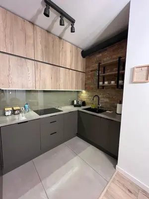 Kuchnia lub aneks kuchenny w obiekcie Apartament WARSZAWA Rondo Daszyńskiego Kolejowa EXPO