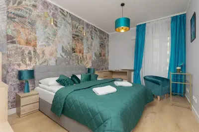 Łóżko lub łóżka w pokoju w obiekcie Bemowo Górczewska Apartment by Noclegi Renters