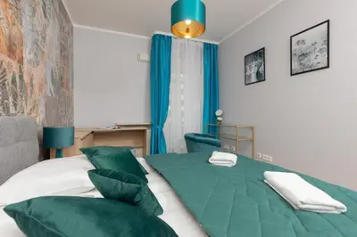 Łóżko lub łóżka w pokoju w obiekcie Bemowo Górczewska Apartment by Noclegi Renters