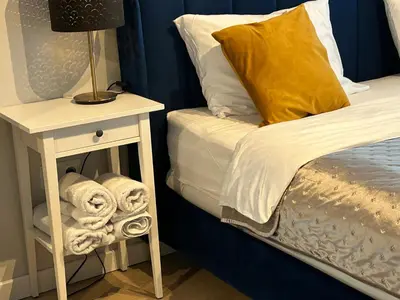 Łóżko lub łóżka w pokoju w obiekcie La Mia Casa STARE MIASTO Warszawa
