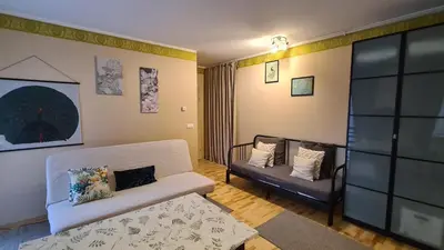 Łóżko lub łóżka w pokoju w obiekcie Apartament Zielony Ogród Ząbki
