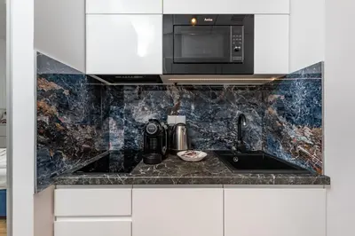 Kuchnia lub aneks kuchenny w obiekcie Kasprzaka 29 B-C by Homeprime