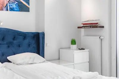 Łóżko lub łóżka w pokoju w obiekcie Kasprzaka 29 B-C by Homeprime