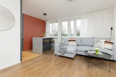 Część wypoczynkowa w obiekcie Modern Studio with Balcony Warsaw Mokotów by Noclegi Renters