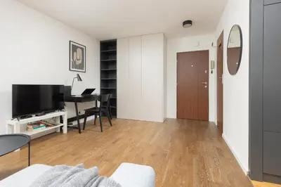 Telewizja i/lub zestaw kina domowego w obiekcie Modern Studio with Balcony Warsaw Mokotów by Noclegi Renters