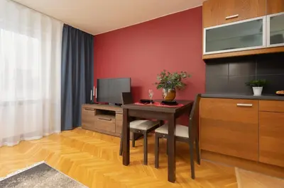 Telewizja i/lub zestaw kina domowego w obiekcie Karmelicka City Studio Apartment by Noclegi Renters