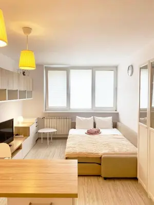 Łóżko lub łóżka w pokoju w obiekcie Warszawa Mieszkanie 4