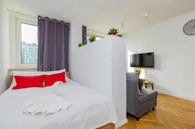 Łóżko lub łóżka w pokoju w obiekcie ShortStayPoland Śliska (B111)