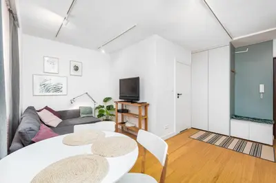 Telewizja i/lub zestaw kina domowego w obiekcie Hoża 36 by Homeprime