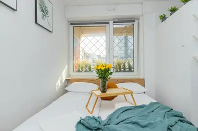 Łóżko lub łóżka w pokoju w obiekcie ShortStayPoland Złota (B110)
