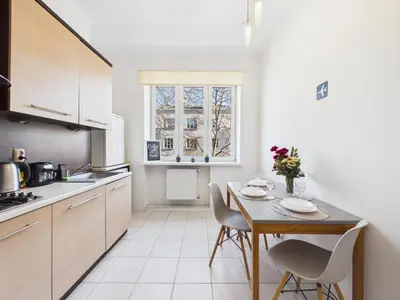 Kuchnia lub aneks kuchenny w obiekcie SuperApart Kazimierzowska 77 - Obok SGH i Metra