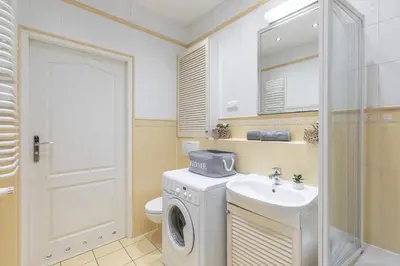 Łazienka w obiekcie SuperApart Powstańców Śląskich 106D - Komfortowe studio Bemowo