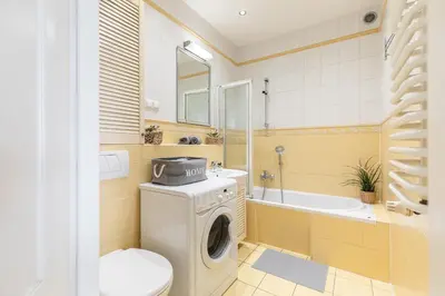 Łazienka w obiekcie SuperApart Powstańców Śląskich 106D - Komfortowe studio Bemowo