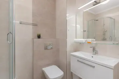 Łazienka w obiekcie Dzielna Apartment Warsaw Wola by Noclegi Renters