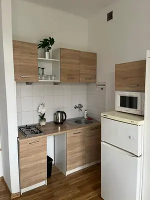 Kuchnia lub aneks kuchenny w obiekcie Słoneczny apartament na Żoliborzu dla 2 osób przy Arkadii