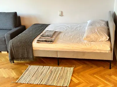 Łóżko lub łóżka w pokoju w obiekcie APART WAWA app 47 WiFi 600 Mbit