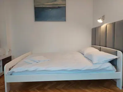 Łóżko lub łóżka w pokoju w obiekcie BEST PLACE