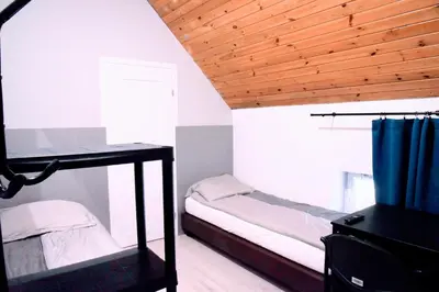 Łóżko lub łóżka w pokoju w obiekcie KOMFORT WILLA+ BIS