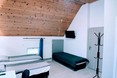 Telewizja i/lub zestaw kina domowego w obiekcie KOMFORT WILLA+ BIS