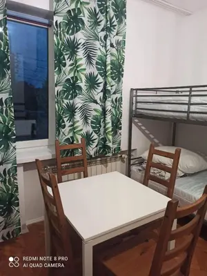 Łóżko lub łóżka w pokoju w obiekcie Hostel Home