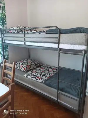 Łóżko lub łóżka w pokoju w obiekcie Hostel Home