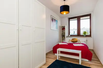 Łóżko lub łóżka w pokoju w obiekcie ShortStayPoland Grodkowska (B114)