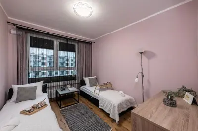 Łóżko lub łóżka w pokoju w obiekcie ShortStayPoland Płużnicka (B115)