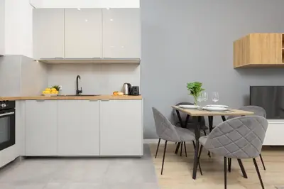 Kuchnia lub aneks kuchenny w obiekcie Cozy Apartments with Parking in the 19th District by Noclegi Renters