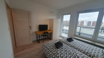 Telewizja i/lub zestaw kina domowego w obiekcie Pokoje Oszmiańska