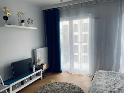 Łóżko lub łóżka w pokoju w obiekcie Wileńska home apartment 2