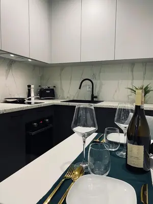 Kuchnia lub aneks kuchenny w obiekcie Wileńska home apartment 3