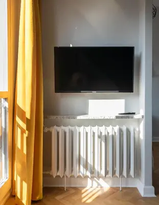 Telewizja i/lub zestaw kina domowego w obiekcie Grzybowska Sundown City Centre Apartment by BookingHost