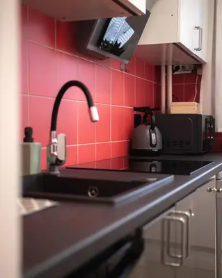Kuchnia lub aneks kuchenny w obiekcie First Green Żoliborz apartament 7