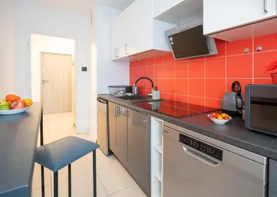 Kuchnia lub aneks kuchenny w obiekcie First Green Żoliborz apartament 7