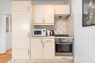 Kuchnia lub aneks kuchenny w obiekcie Racławicka 42 by Homeprime