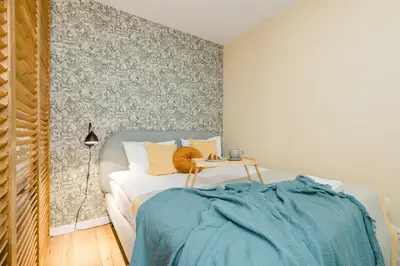 Łóżko lub łóżka w pokoju w obiekcie ShortStayPoland Sierakowskiego (B117)
